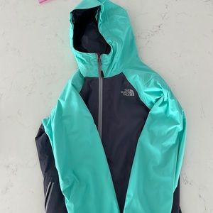 Woman’s north face rain jacket